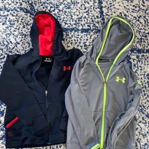 Two under armour youth small zip up hoodies
